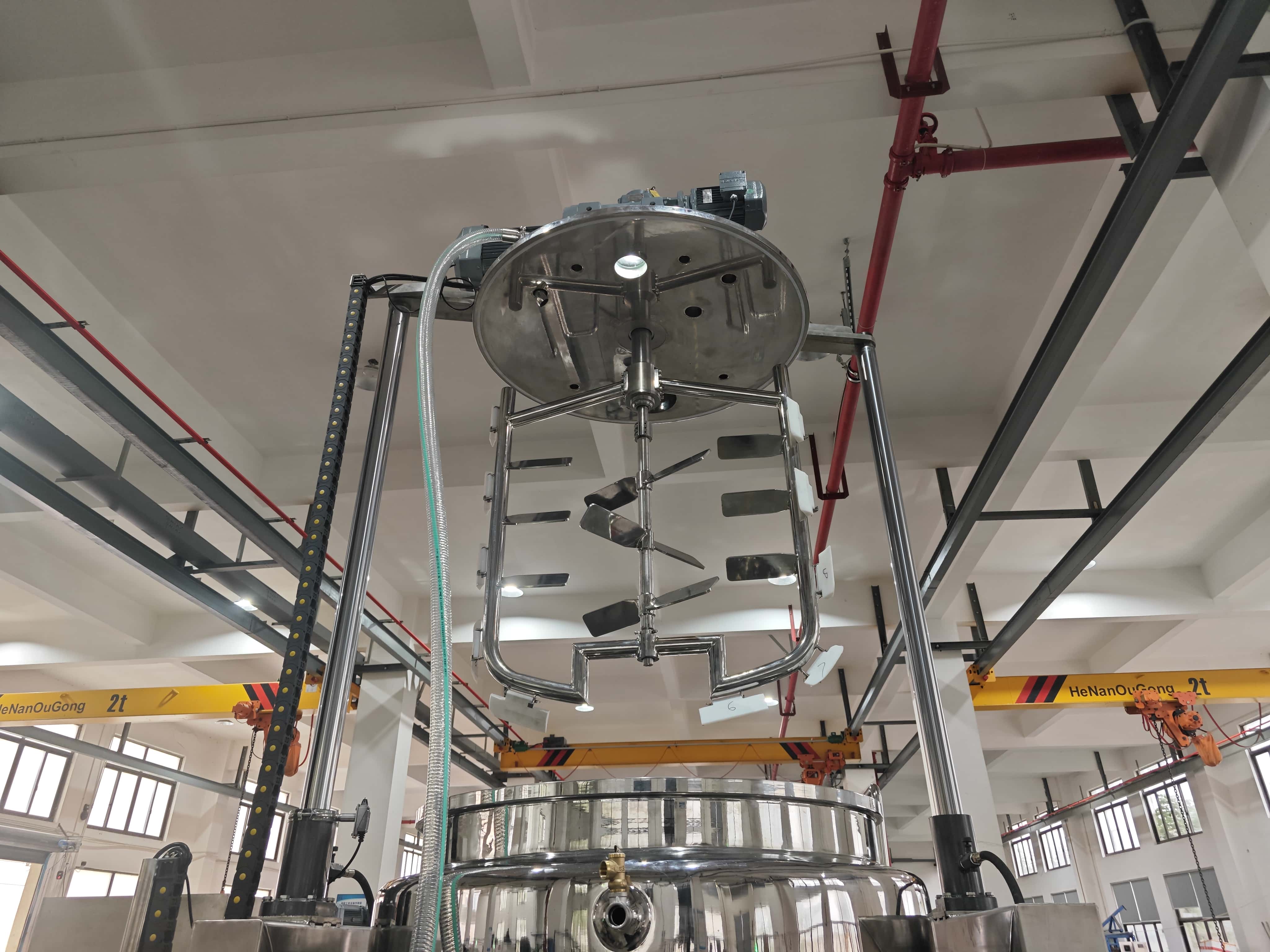 Lift-Type Tiltable Wall-Scraping System with Bottom Emulsifier